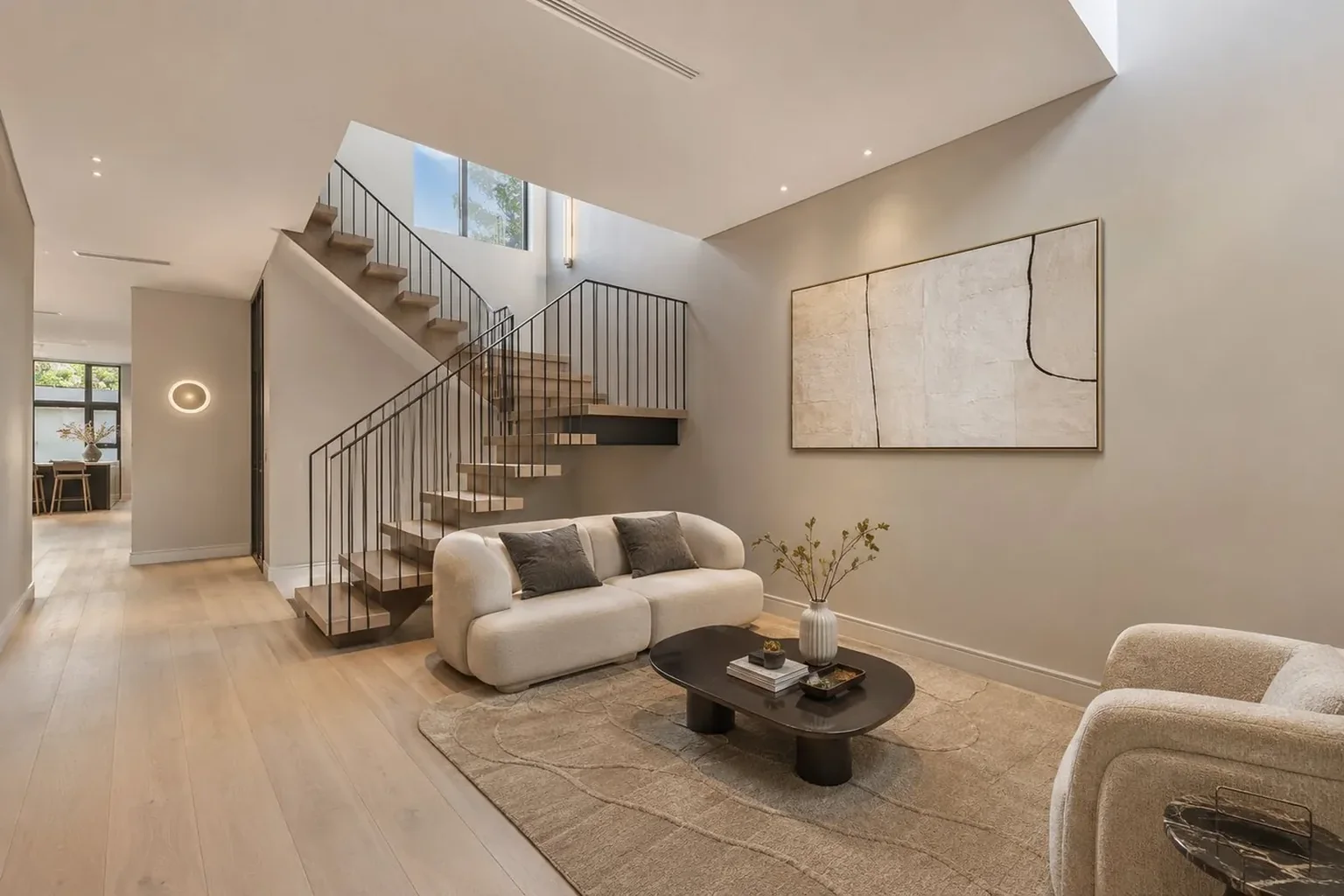 Feature open-tread staircase with steel balustrade — custom residential build Melbourne