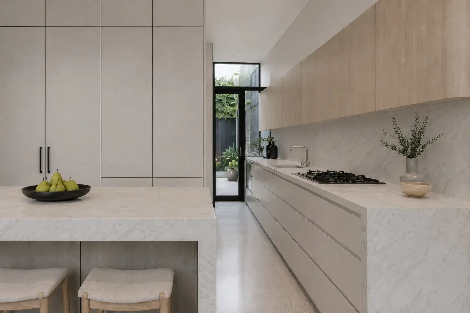 Bespoke kitchen with marble benchtop and timber cabinetry — Richmond terrace renovation by Wednesday Projects